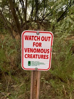 venomous creatures warning sign