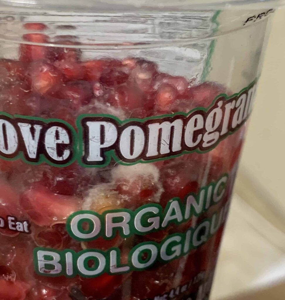 pomegranate arils in cup