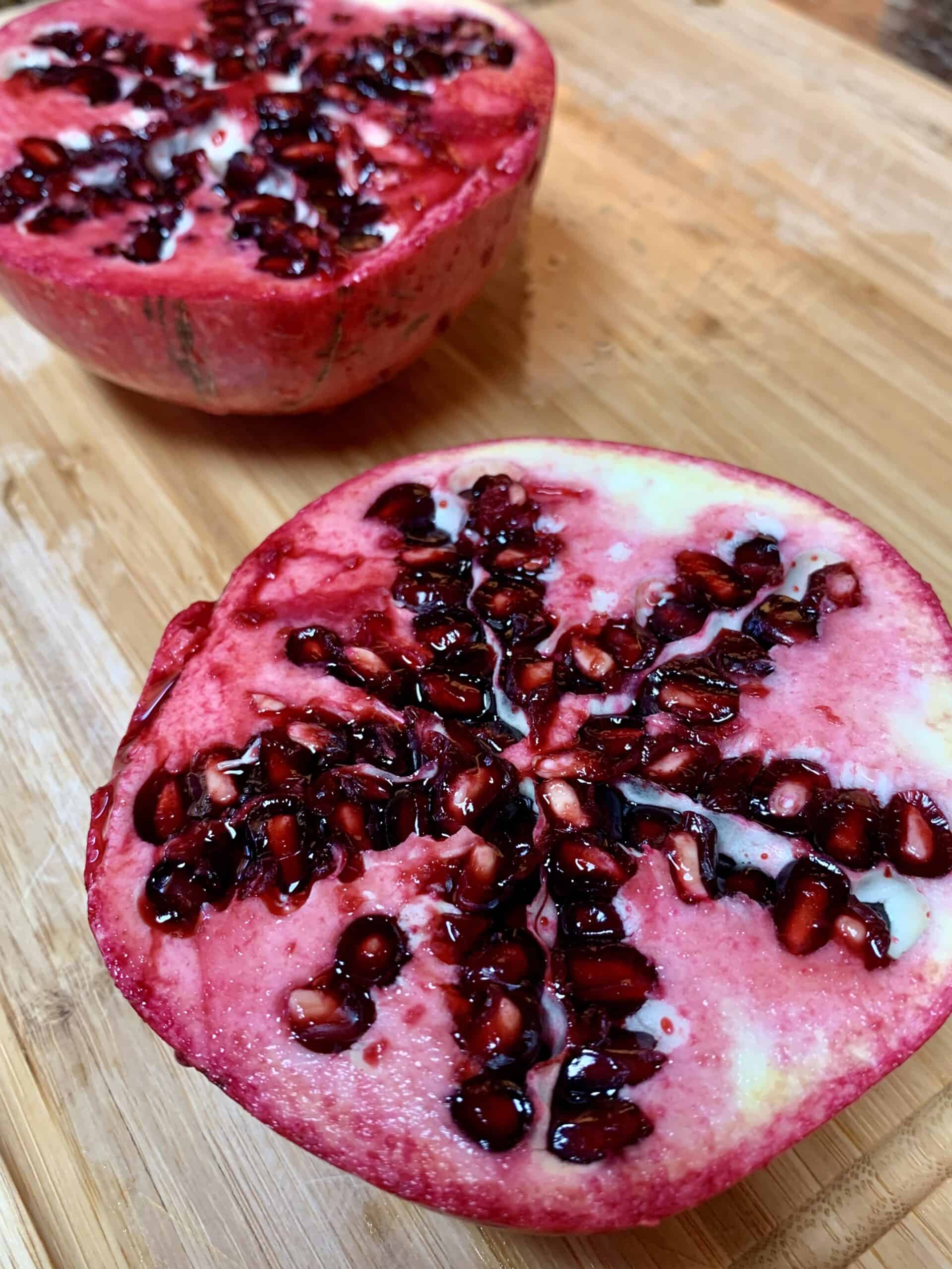 perfectly-ripe pomegranate cut in half